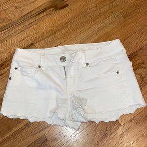 American Eagle white stretch jean shorts, size 4. Worn but in fair condition